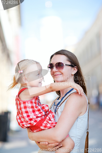Image of Mother and daughter portrait outdoors