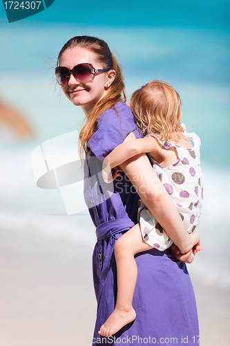 Image of Mother and daughter on tropical vacation