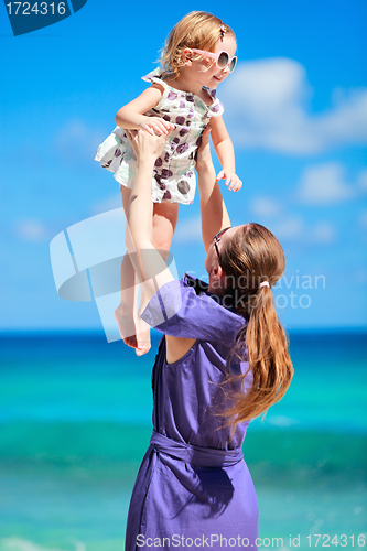 Image of Mother and daughter on beach vacation