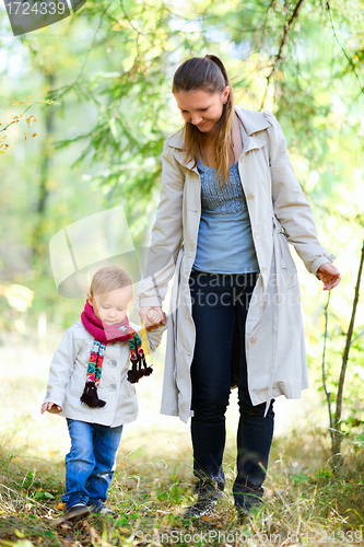 Image of Mother and daughter at forest