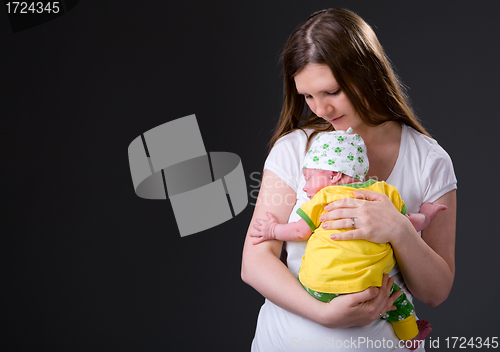 Image of Happy young mother and newborn girl