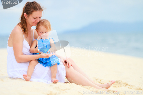 Image of Young family at beach