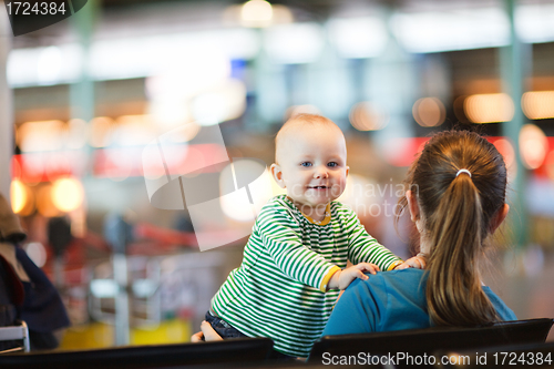 Image of Mother And Baby At Airport.