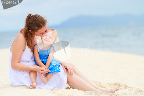 Image of Loving mother and daughter on tropical beach