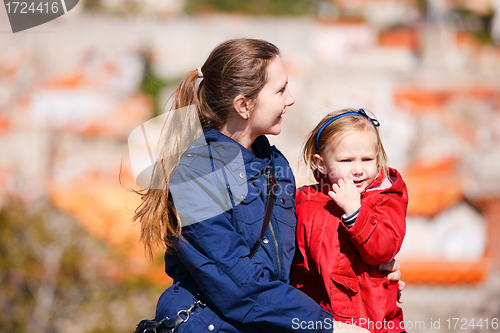 Image of Mother and daughter portrait outdoors