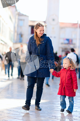 Image of Mother and daughter in city
