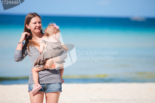 Image of Mother and daughter on tropical vacation