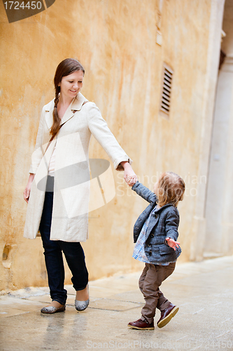 Image of Mother and daughter in city