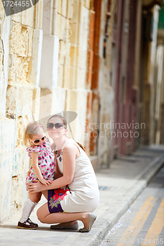 Image of Mother and daughter portrait outdoors