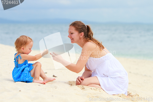 Image of Loving mother and daughter on tropical beach