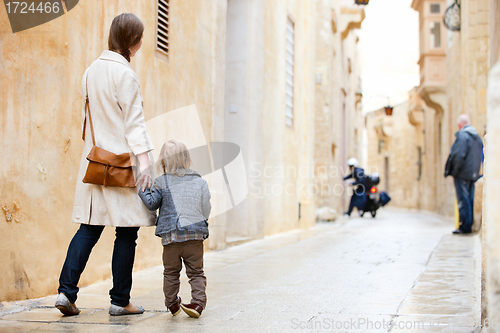 Image of Mother and daughter in city