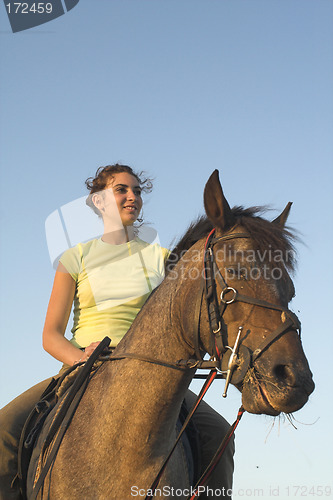 Image of girl riding a horse