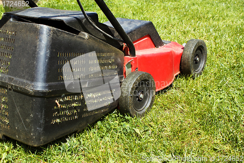 Image of Lawnmower on grass