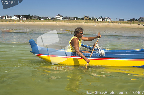 Image of man in pirogue