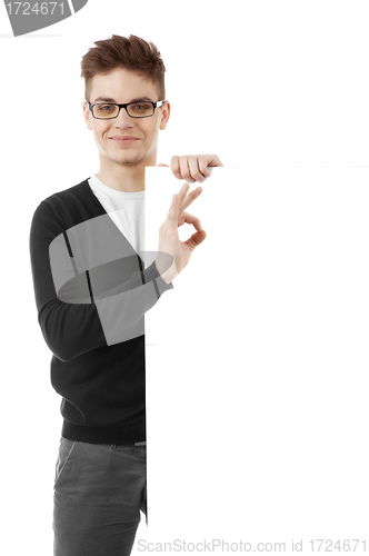 Image of Young man with a blank baner