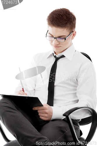 Image of Young man writing