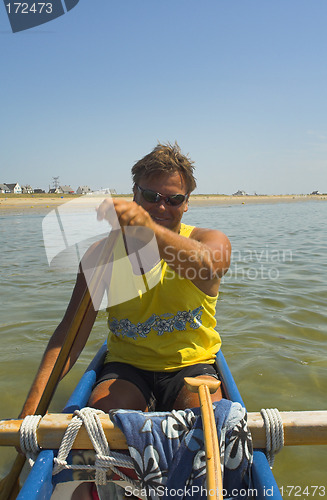 Image of man in pirogue