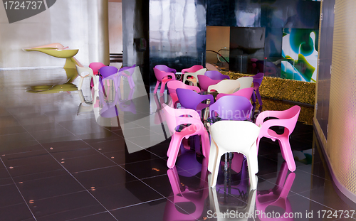 Image of plastic chairs in the interior