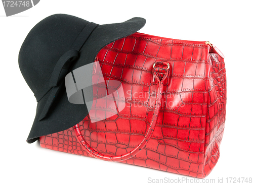 Image of Red Fashion ladies handbag and a black felt hat