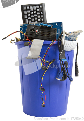 Image of electronic scrap in blue trash can