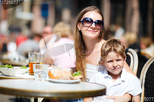 Image of Family having lunch outdoors 