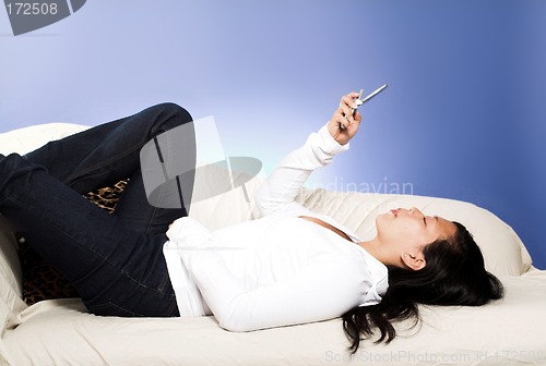 Image of laying down on couch