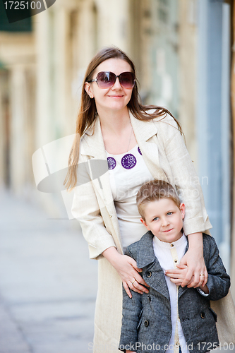 Image of Mother and son outdoors in city