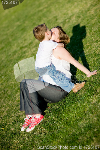 Image of Family fun at sunny day