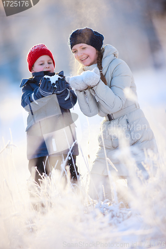 Image of Mother and son outdoors at winter