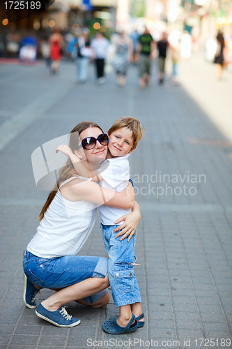 Image of Mother and son hugging