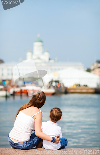 Image of Mother and son enjoying views of city center