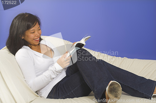 Image of reading and smiling