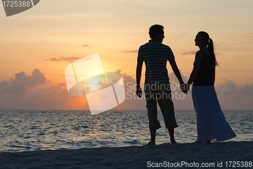 Image of Romantic couple at sunset