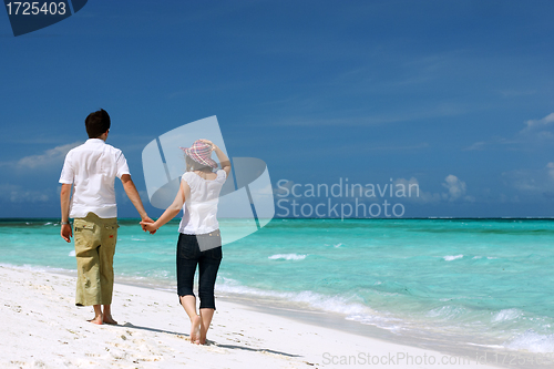 Image of Young couple on the beach