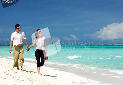Image of Young couple on the beach