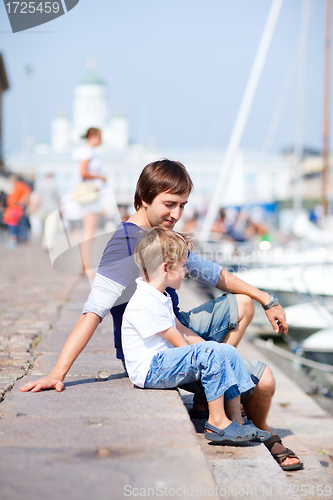 Image of Father and son in city harbor