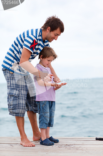 Image of Father and son caught fish