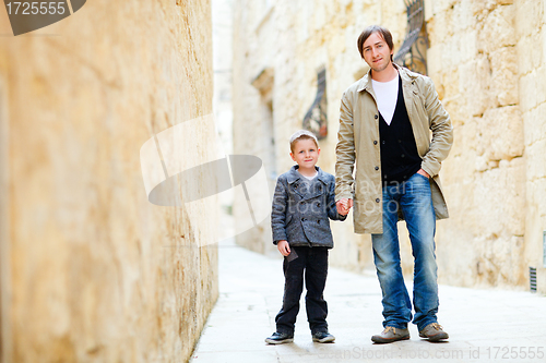 Image of Father and son in city