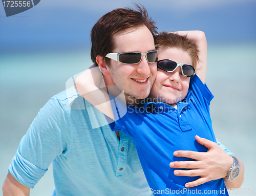 Image of Happy father and son