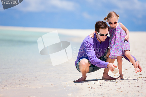 Image of Father and daughter on beach