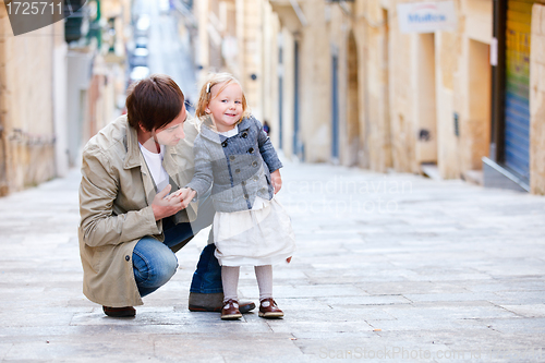 Image of Father and daughter in city