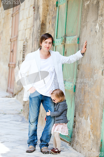 Image of Father and daughter in city