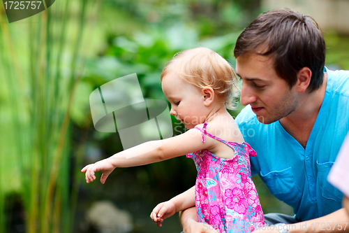 Image of Father and daughter outdoors