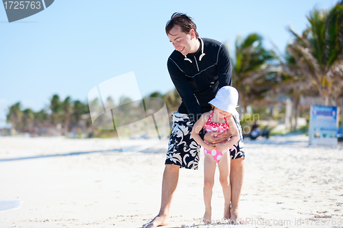 Image of Father and daughter at beach