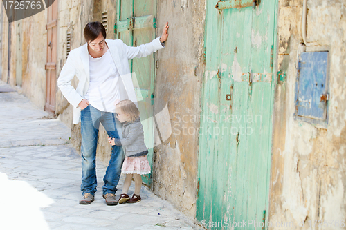 Image of Father and daughter in city
