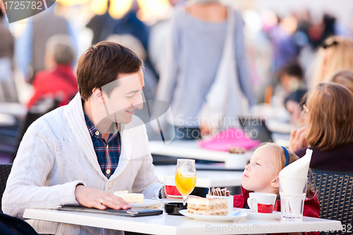 Image of Family at outdoor cafe