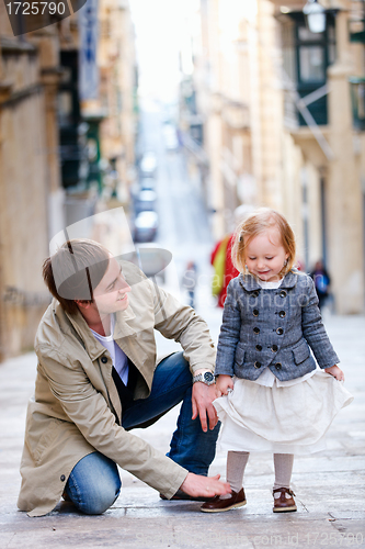 Image of Father and daughter in city