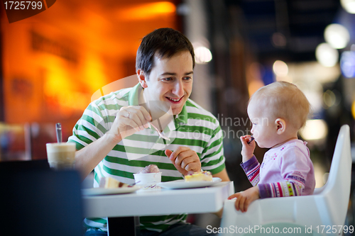 Image of Father and daughter in cafe