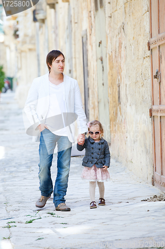 Image of Father and daughter in city