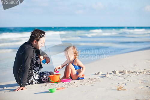 Image of Father and daughter at beach